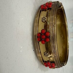 Gold-Tone Floral Accent Bangle Bracelet with Red Beads